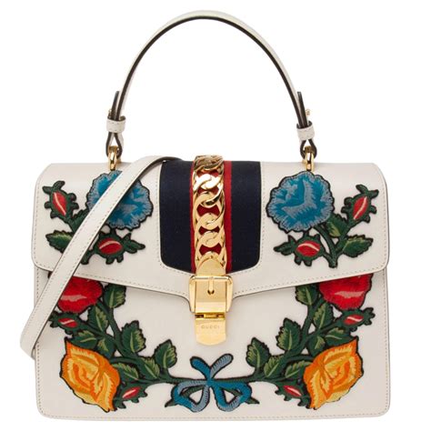 gucci white sylvie embroidered top bag price|Gucci sylvie 1969 bag.